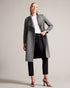ROSEANE-Outerwear-Wrap yourself in elegance and warmth with the exquisite ROSEANE. Made from 100% wool with a herringbone texture, this coat exudes timeless style. Metal edge details refine the look for everyday wear. Wrap coat 100% wool Belted waist Button fastening Metal hardware tipping Pockets Herringbone texture Midi length- Ted Baker Romania